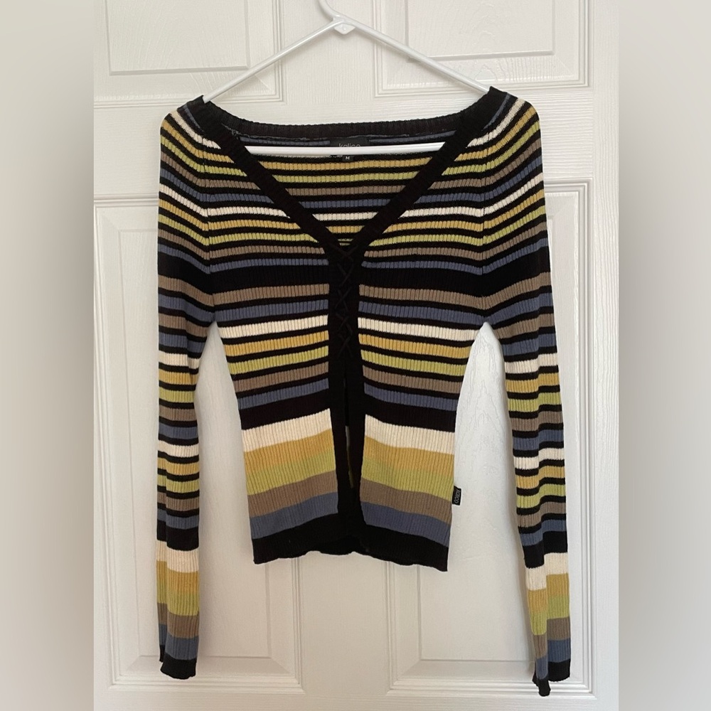 Striped sweater with corset-style detail